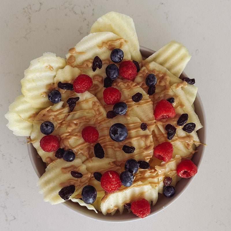 crinkle cut loaded apple chips in a baby by beach bowl