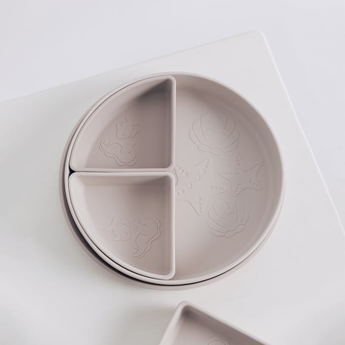 Baby by beach tableware set in the beautiful seashell tones, bowl used with 2 dividers featuring the baby by beach characters.