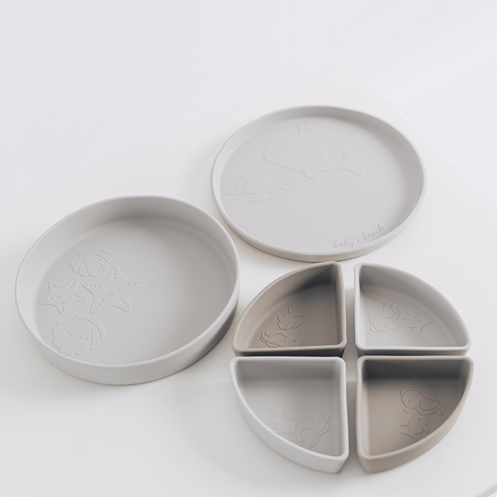 Baby by Beach complete silicone tableware set with bowl, plate and 4 dividers in warm sand tones.